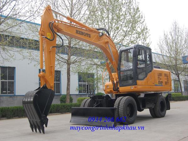 máy xúc đào bánh lốp HENGTE gầu 0.55m3